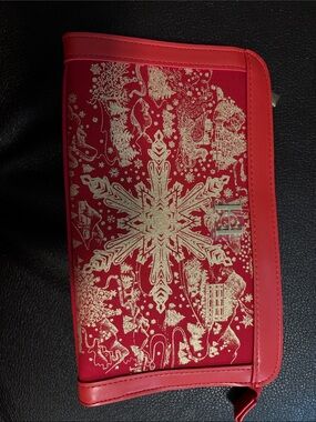 Carolina Herrera red and gold holiday pouch